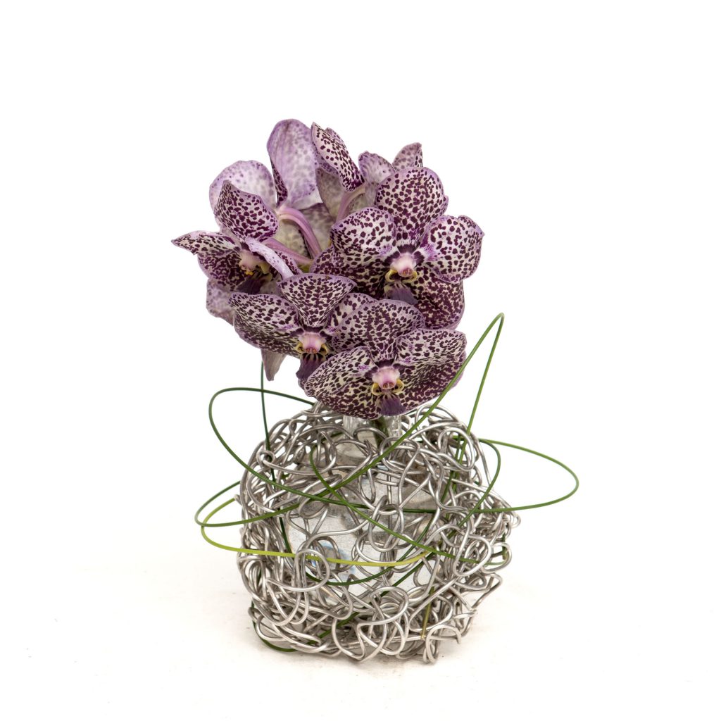 Bulb design in silver with orchid